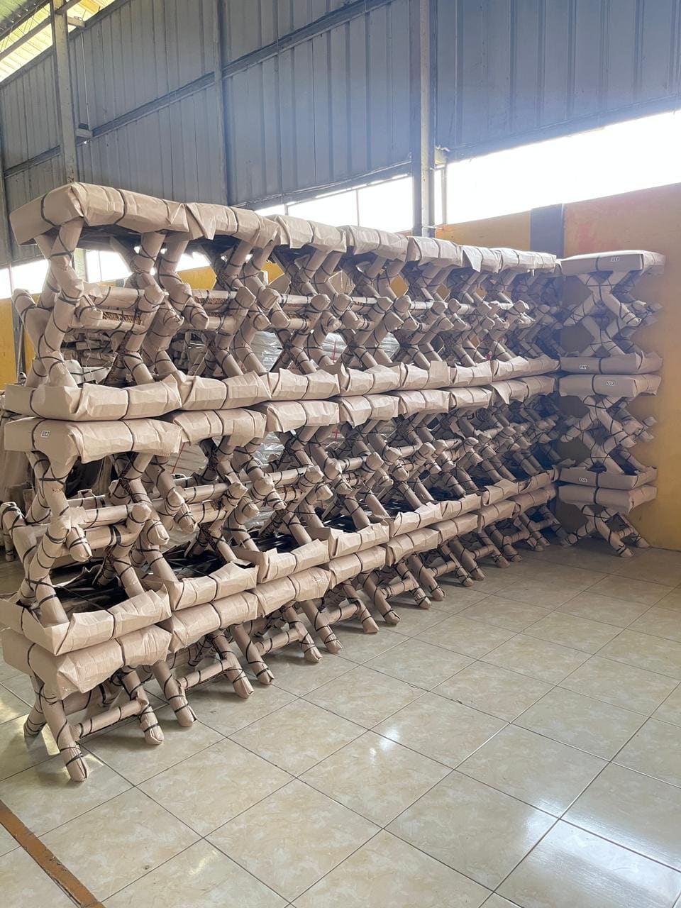 Wrapped seating stacked in the warehouse